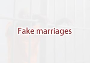 What are the consequences of engaging in a fake green card marriage?